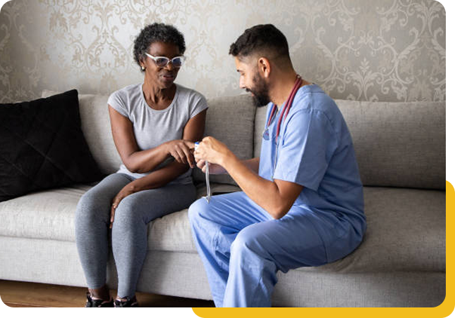 Doctor visiting patient at home